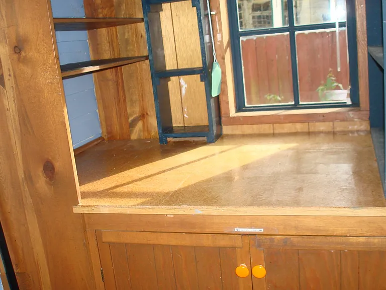 Counter Space above Cabinets
for Trash Bins in the Mud Room