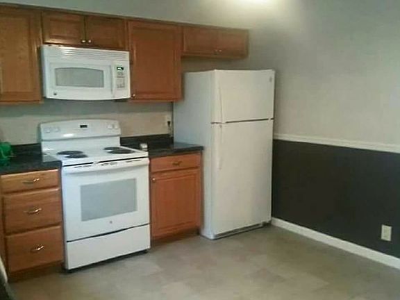 View of kitchen from back entrance.