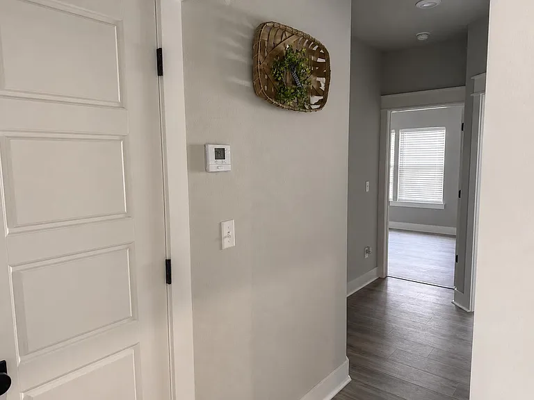 Hallway leading to two guest bedrooms and guest bathroom