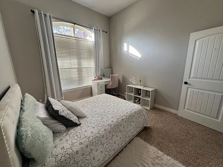 Room #2 with beautiful large windows.