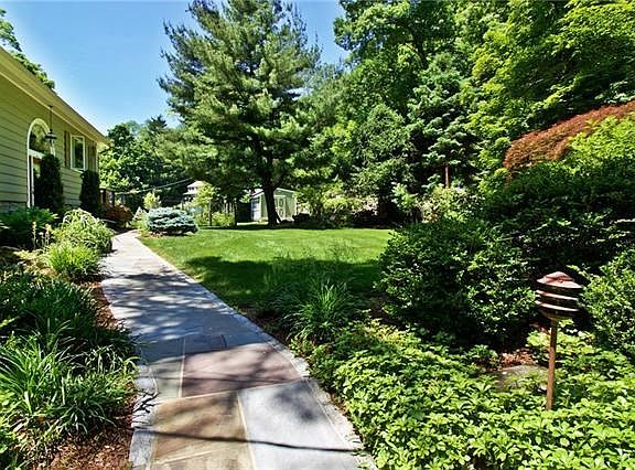 Flagstone pathway invites you home