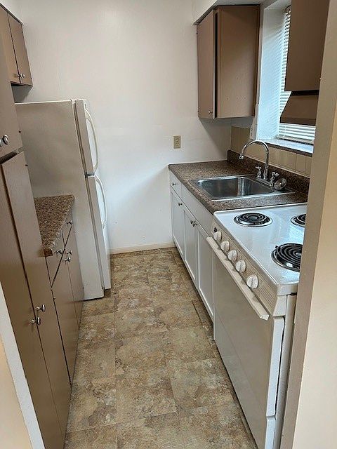Kitchen with window for good light.