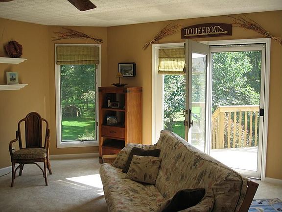 Very large Family Room w/ WBFP and access to deck