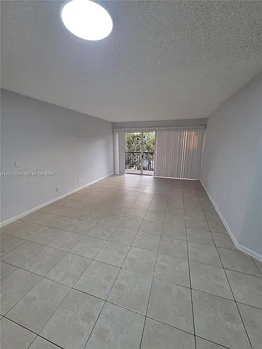 8871 Wiles Rd Photo 1