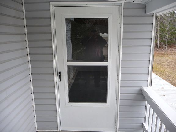 Rear enclosed porch entrance