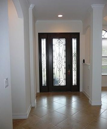Beautiful Foyer with Custom Front Door