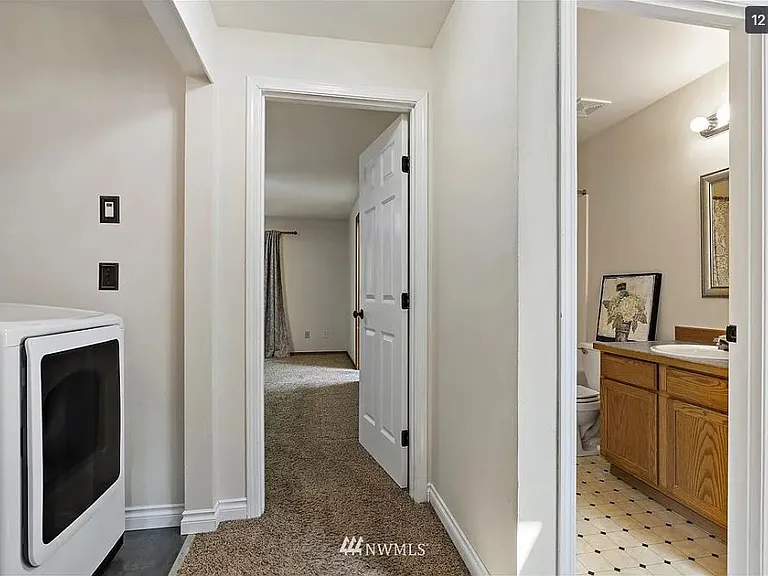 Upstairs Hallway Looking into Master Bedroom/ Guest Bathroom.
