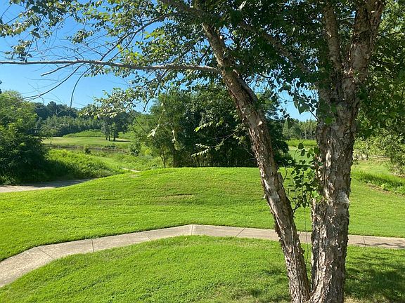 Beautiful view of golf course with access to cart paths for walking.
