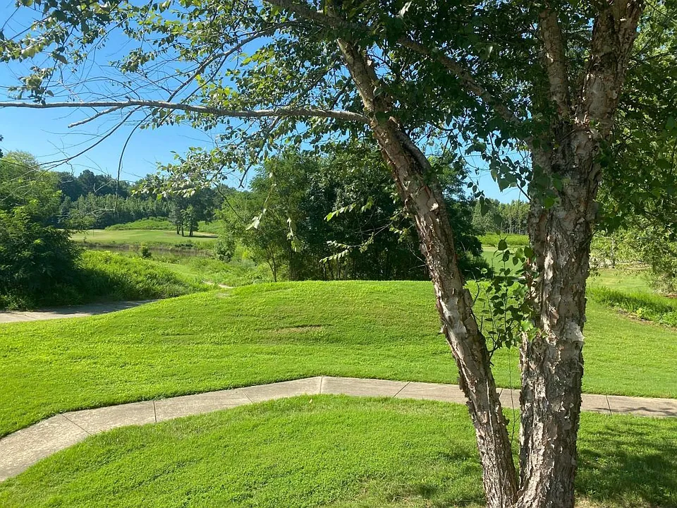 Beautiful view of golf course with access to cart paths for walking.