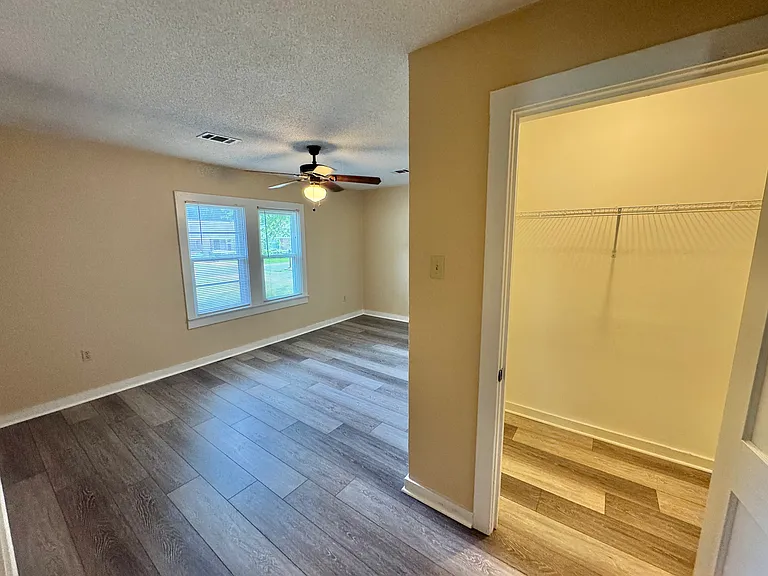 Bedroom 1 with Closet & Half Bath Attached