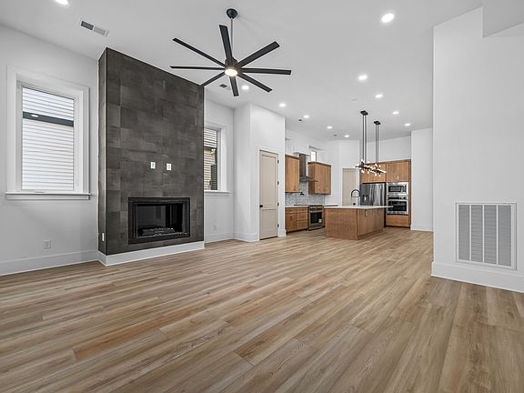 Walk in to 12' ceilings, large great room with gas fireplace