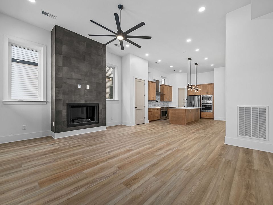 Walk in to 12' ceilings, large great room with gas fireplace