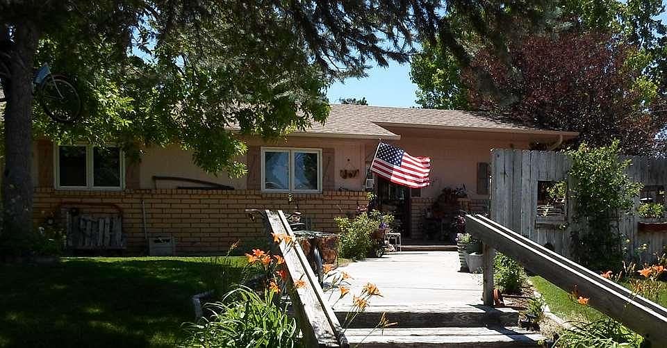 1st image of 909 E 27th Ave