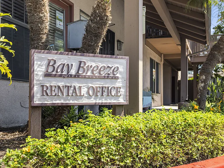 Outdoor signage at Bay Breeze Apartments in Costa Mesa, CA