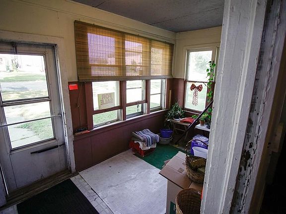 Enclosed front porch.