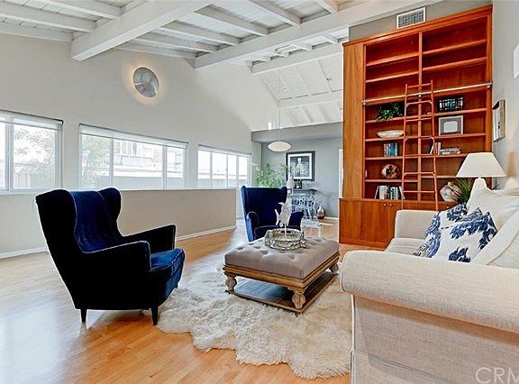 Great Room Living Area and Adjacent Formal Dining Area