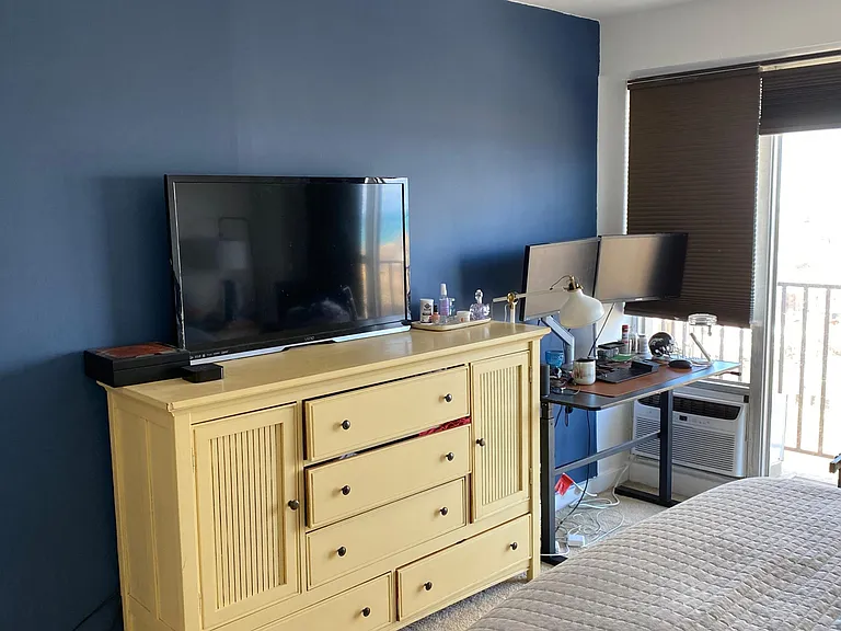 Navy Blue Accent Wall on left. This Navy Blue color now used on both sides of this wall. Other side of wall is living room, where some set up AV equipment, etc.
