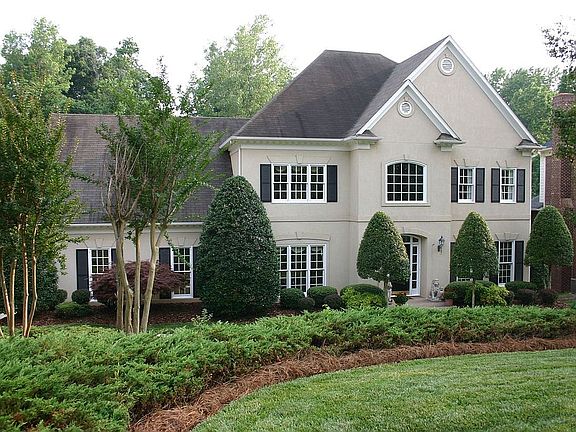 Street Level View, Unique Home with Hard Coat Stucco