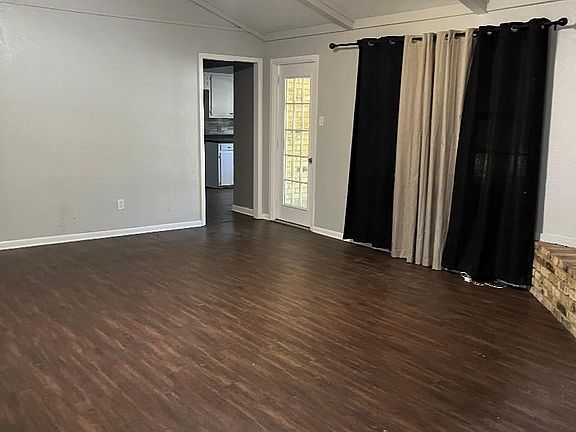 Livingroom entry way to kitchen and sunroom/back yard.