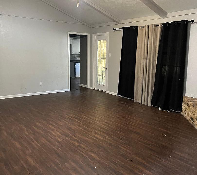 Livingroom entry way to kitchen and sunroom/back yard.
