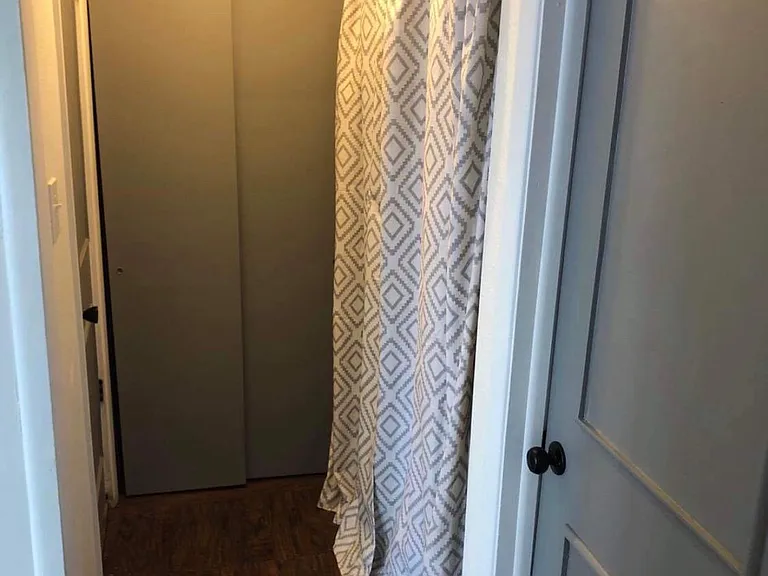 Hallway with laundry area.