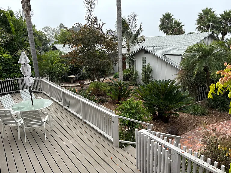 Private deck facing garden area.