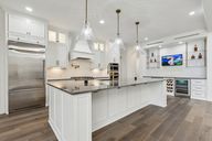 Chefs kitchen with ultra high end appliances Monogram and Cafe. Quarzite island