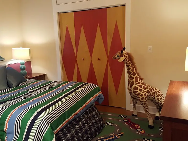 Bedroom 1 - shown furnished as a kids room with queen bed