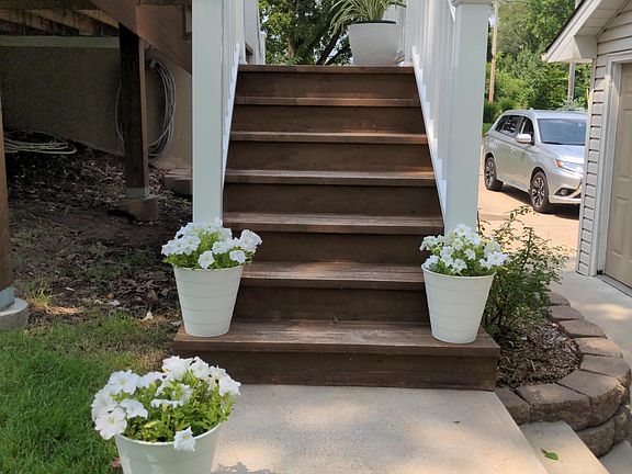 steps going to the back yard and to the driveway.