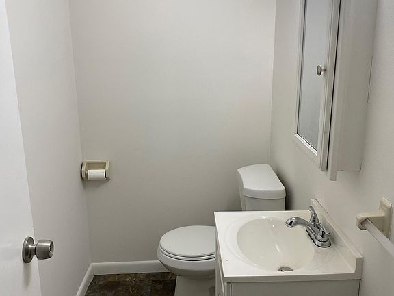 Half bathroom off kitchen