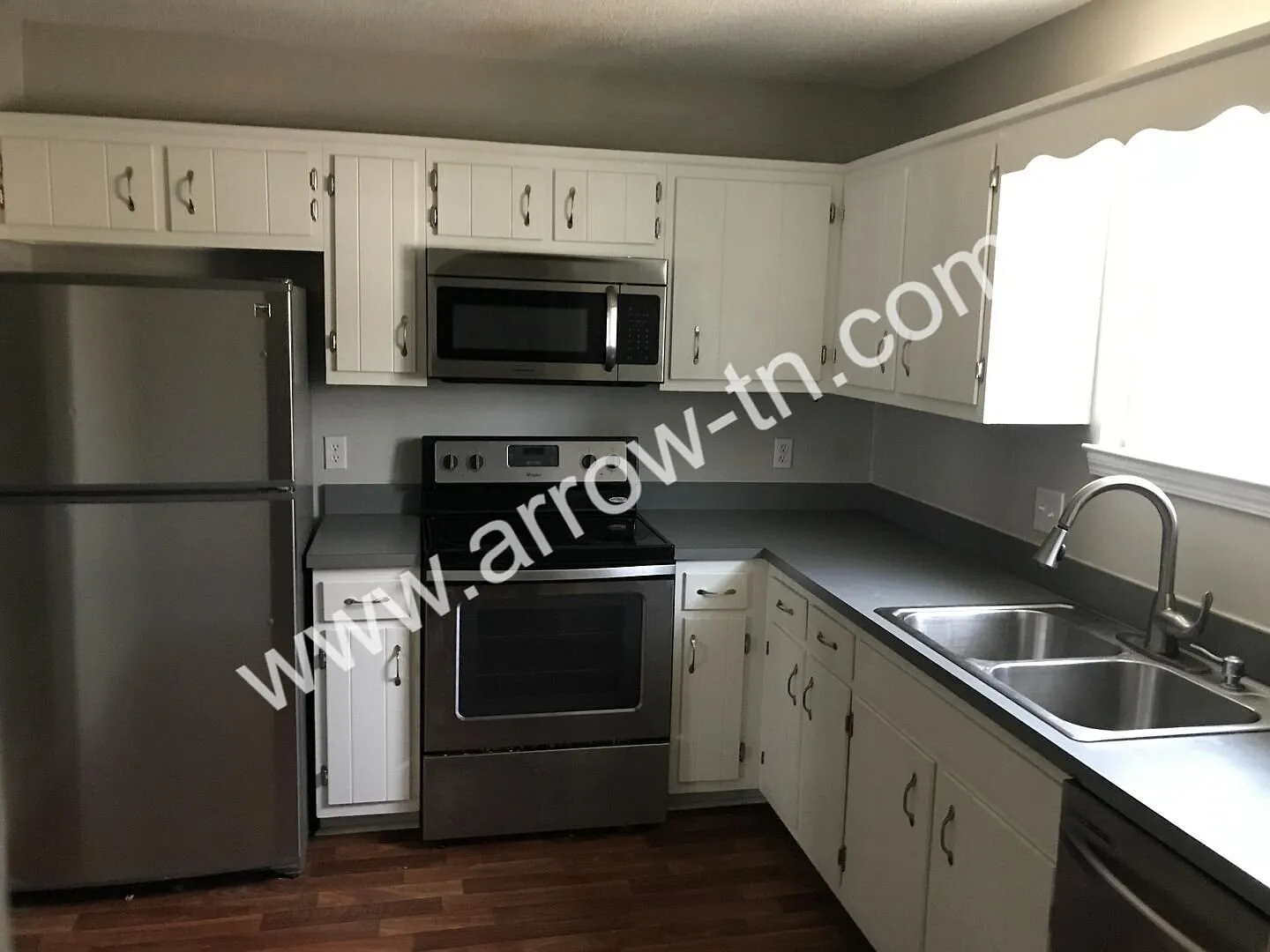 Great 2 Bed Townhome with 2.5 Baths and a Fenced Backyard! — Photo 4
