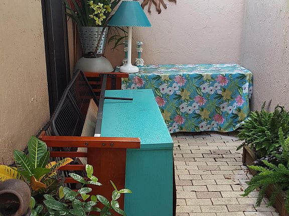 Patio at front of condo. All plants are current tenants and do not come with the unit.