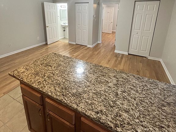 Kitchen view of living space 
attached powder room for guests