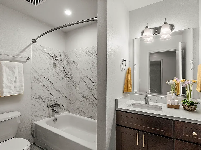 Experience tranquility in this elegantly designed bathroom with modern amenities. Experience tranquility in this elegantly designed bathroom with modern amenities.