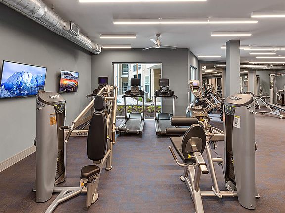 24-Hour State-of-the-art Fitness Center with Cardio & Weight Training Equipment