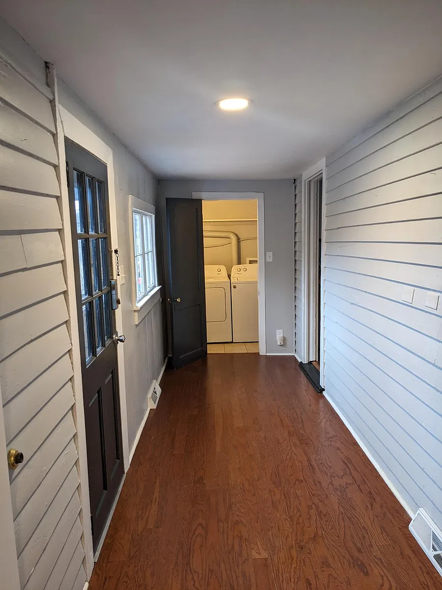 entry from deck, laundry room at end, doors into kitchen and living give great circulation - 225 E Sprague St #A
