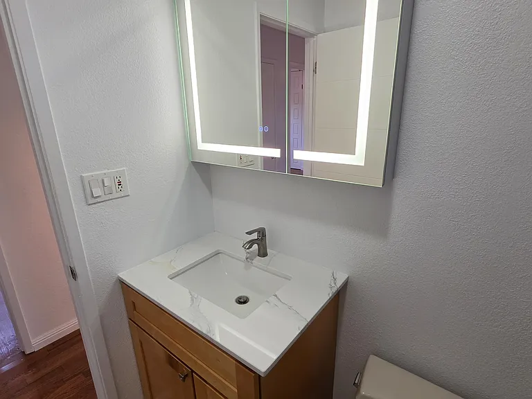 both bathrooms have new vanity mirrors with antifog and additional storage