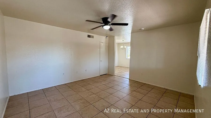 Building Photo - 3128 E Cicero St #202