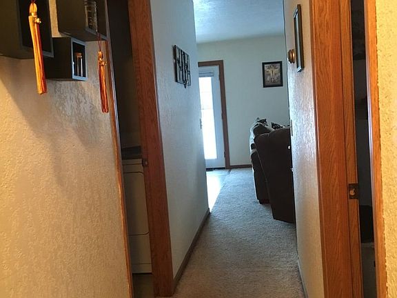 Hallway leading into living room and kitchen