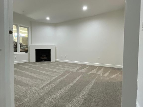 master bedroom with fireplace