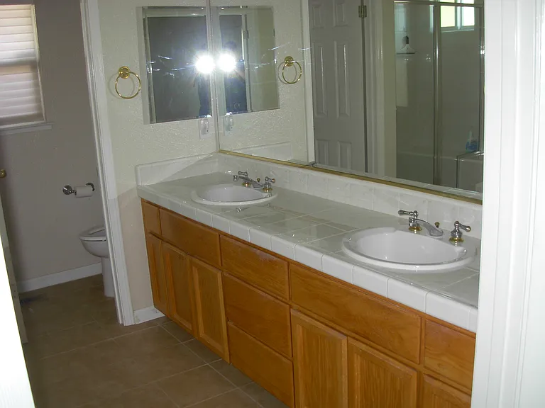 double sink in two full bathrooms