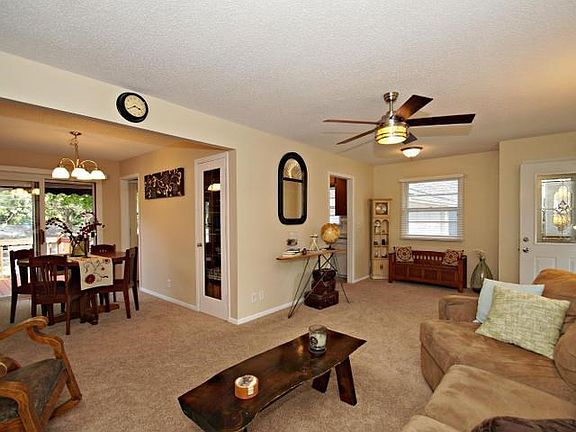 Amazing floor plan for entertaining. Open yet cozy with loads of natural light. 

BONUS: Wood flooring under carpet throughout the main level!