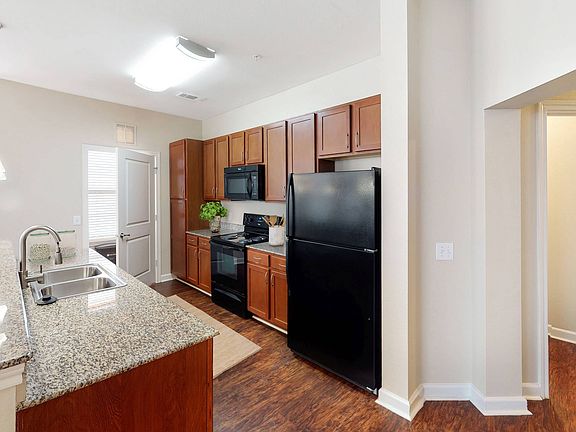 Kitchen Area with Black Appliances