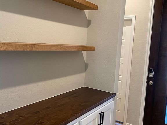 Custom cabinets & shelves in entry