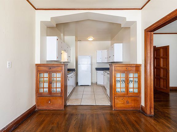 Eat in kitchen with period details and freshly painted cabin