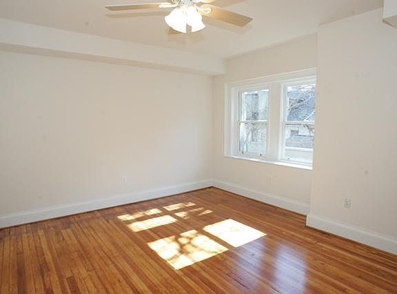 One of the two large bedrooms. Natural sunlight streams in.