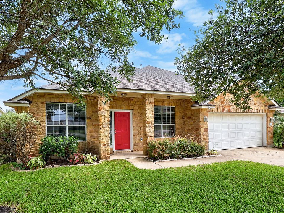 Beautiful front yard; single story home backing into a greenbelt