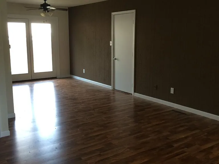Please note: photos were taken prior to renovation. New luxury vinyl plank flooring, fresh paint throughout, new stainless steel appliances, and a new peninsula countertops are currently being installed.