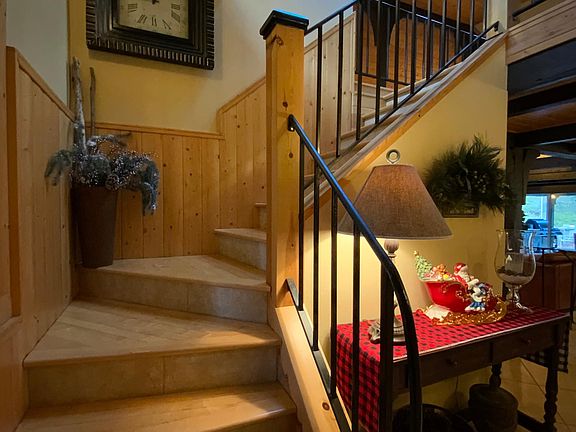 Stairs open to skylights