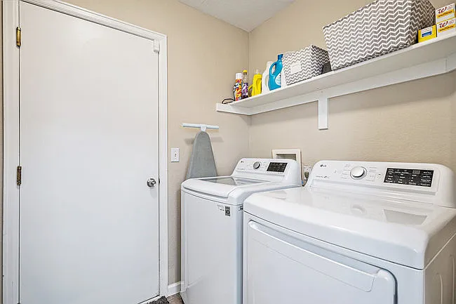 laundry room with washer and dryer